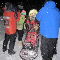 Aliy med hund i sleden